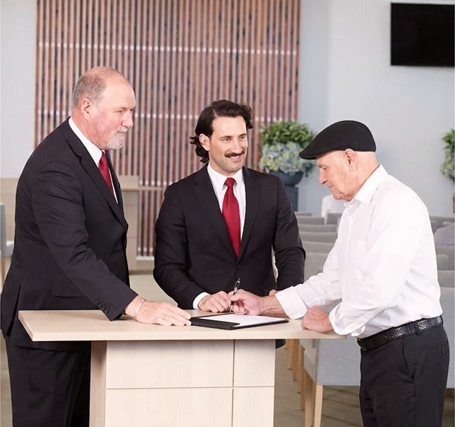 Tuckers funeral directors with man