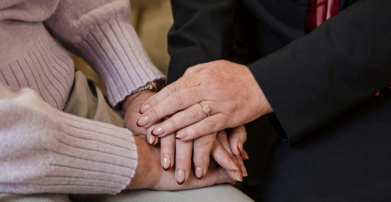 Tuckers funeral director greeting a man at the chapel