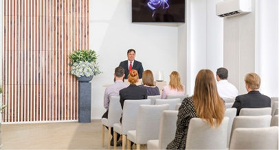 a man doing a eulogy