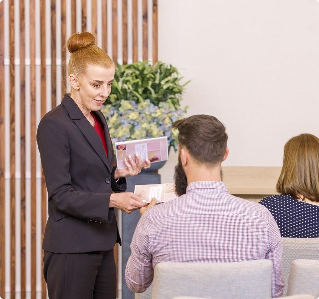 Tuckers funeral director with man