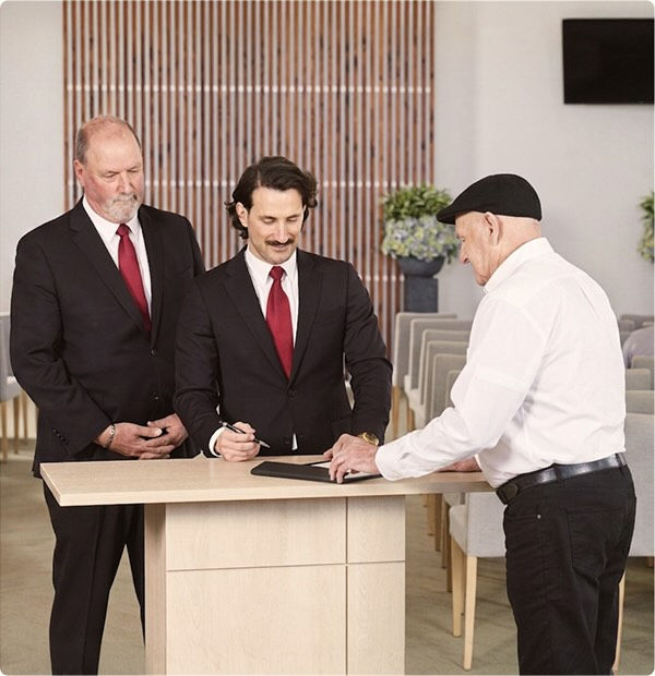 Tuckers funeral directors with man