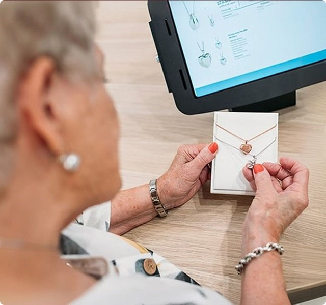 women looking at jewellery