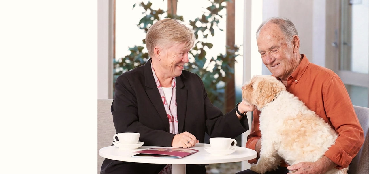 Tuckers funeral director with man and dog