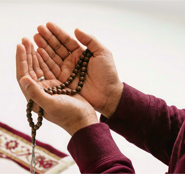person holding a rosary